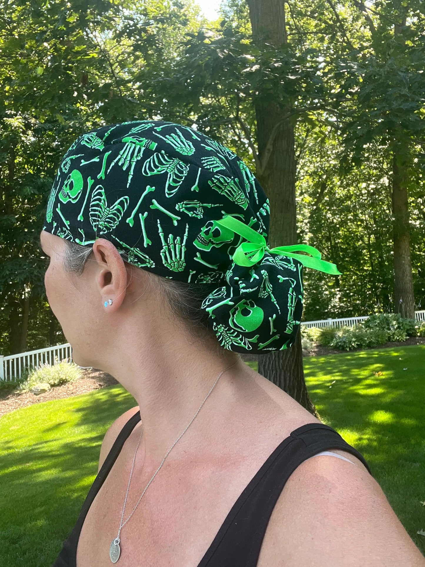 XRAY bones green glow ponytail scrub cap womens