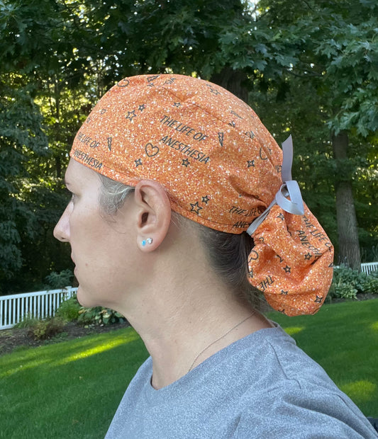 Taylor Swift life of ANESTHESIA orange glitter print ponytail scrub cap womens